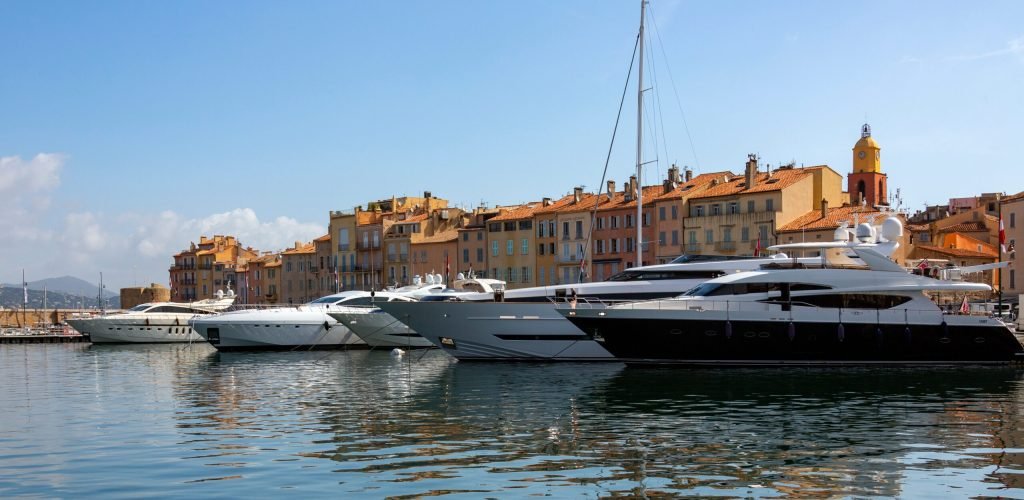 St Tropez on the French Riviera in the South of France St Tropez - France. 06.13.12. Luxury yachts moored in the harbor of the resort of St Tropez on the French Riviera in the South of France.